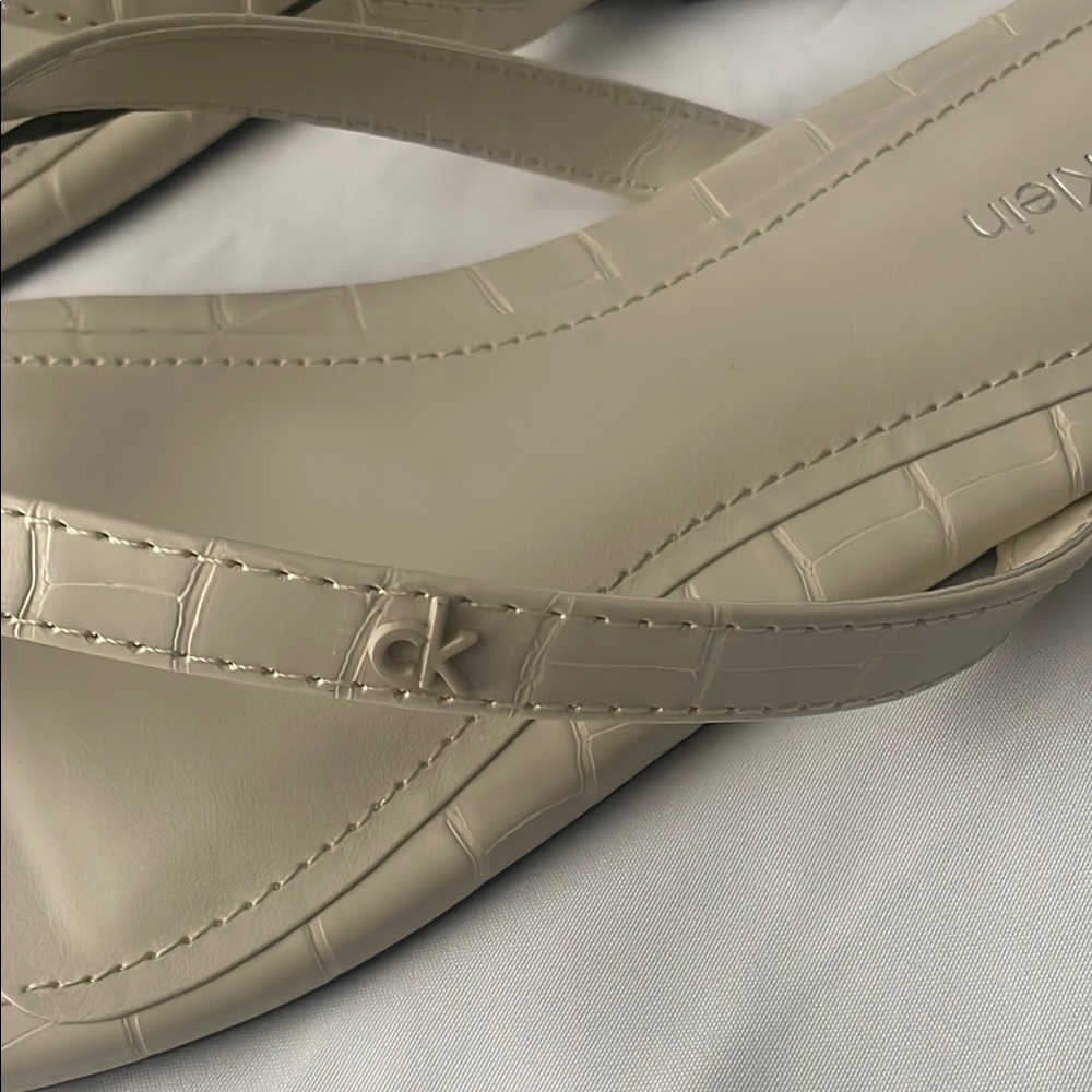 Calvin Klein Cream Sandals with Minimalist Design